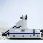 The image shows a specialized machine labeled as a "Plastic Pelletizing Machine." This equipment is used for recycling or processing plastic materials into small, uniformly shaped pellets. It consists of various interconnected sections, each performing a specific function, such as feeding, melting, and extruding. The pellets in the image suggest that the output of this machine is ready for further manufacturing or processing. The ISO and CE markings indicate that the machine meets international quality and safety standards. This setup is essential for transforming plastic waste or raw material into a reusable form in different plastic production processes.